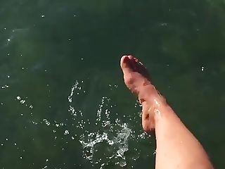 Feet with sexy toes in water 